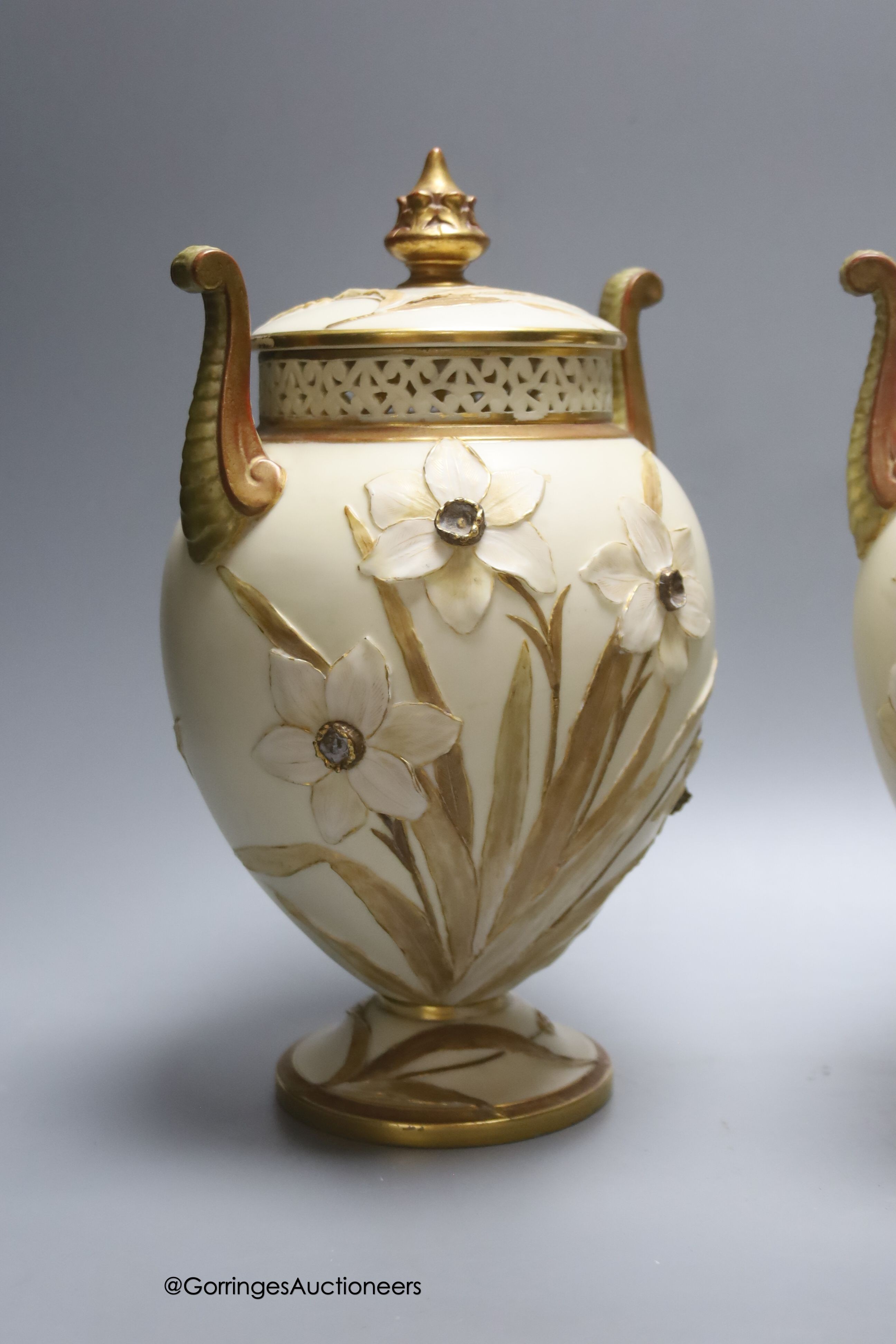 A pair of Grainger & Co. Worcester Royal China Works porcelain pot pourri vases and covers, height 28cm